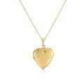 Close-up of vintage heart locket necklace with rose engraving detail - Engraved Heart Locket
