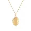 Detail view of a vintage gold oval locket necklace with delicate engravings - Scroll Oval Locket