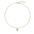 Detail view of gold stainless steel choker necklace with a round zircon pendant. - Gold White Zirconia Oval Choker