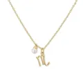 Detailed close-up showing the Scorpio zodiac symbol and pearl pendant on a gold chain necklace - Scorpio / Gold