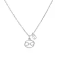 Macro detail of Cancer zodiac symbol pendant with a white pearl on a silver necklace. - Cancer