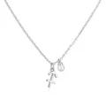 Close-up of silver Sagittarius zodiac sign pendant and small pearl on delicate chain - Sagittarius