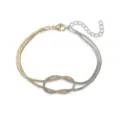 Dettaglio del nodo dell'infinito bicolore su un bracciale a doppia catena a serpente. - Nodo Infinito Catena a Serpente / Oro e Bianco Colorblock