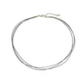 Close-up of triple-layer handmade black braided cord necklace with elegant gold clasp. - Black