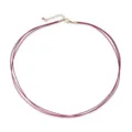 Detailed view of triple-strand burgundy woven cord necklace with gold-plated clasp - Burgundy