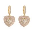 Close-up of gold huggie earrings with double-layered pink and clear heart charms - Pink Zirconia Heart Earrings / 1 Pair Pack / Gold