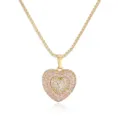 Detailed macro view of a luxury gold heart necklace featuring pink and white gemstones - Pink Zircon Heart Necklace / 1 Piece / Gold