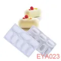 Detailed view of white silicone baking mold with delicious mousse cake and raspberry garnish. - EYA023 8-Cavity Small Pillow 30x17.5x3.5cm