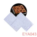 Silicone geometric baking mold detail view showing white flexible tray and finished cake. - EYA043 2-Cavity Square Decoration
