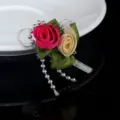 Close-up of handmade ribbon roses with silver bead chains for DIY gift box decoration. - 5x4cm / Rose Red
