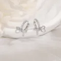 Silver color bow knot huggie hoop earrings with sparkling pavé cubic zirconia stones - Full Rhinestone Bowknot Hoop Earrings / Copper (Silver Gold)