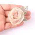 Handcrafted organza camellia flower DIY accessory with green leaf for apparel and headwear. - 02 Champagne