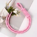 Close-up of pink manual braided rope charm for DIY bag and phone accessories. - 32# Deep Pink and White
