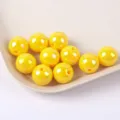 Close-up of bright yellow iridescent acrylic beads for DIY jewelry making on a tray. - 8mm 30Pcs/Pack / Yellow
