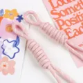Detail view of pink nylon woven cord charms for phones or bags with heart-warming props. - 11# Light Pink
