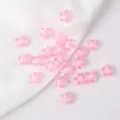 Close-up view of 11mm pink acrylic star beads for DIY jewelry and necklace crafting - 50 Pieces/Pack / Light Pink