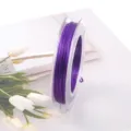 Primer plano hilo elástico plano morado, bobina de cordón abalorios 0.8mm para manualidades DIY. - Púrpura