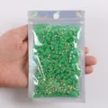 Grüne flache Harz-Strasssteine im Beutel, glänzende DIY-Nagelkunst-Diamanten, 1 Stk. - 2 mm - 5000 Stück / 52 Olivgrün AB