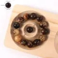 Detailed view of carved Bodhi root prayer beads showing natural texture and specifications. - 18# Tiger Skin Bodhi Seeds