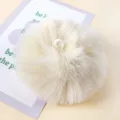 Detailed view of fluffy white faux fur pom pom with elastic loop for DIY craft accessories. - 09# Off-White