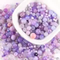 Detailed macro view of mixed purple and pink Bohemian glass beads for DIY jewelry - 20.00g / 05