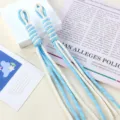 Close-up of sky blue and white braided nylon rope pendants for DIY bag charms - 1 Piece/Pack / 03# Cream White + Blue Dots
