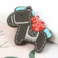Macro detail of a handcrafted wooden horse charm featuring a red wealth pouch design - 1 Piece / 04# Grey-Brown-Blue