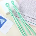 Detail of two-tone braided nylon rope bag charms in mint and cream white. - 1 Piece/Pack / 04# Cream White + Pale Green