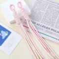 Close-up detail of two-tone pink and white braided nylon cord keychain for bag DIY charm - 1 Piece / 08# Cream White + Taro Pink Dots