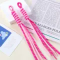 Detailed macro view of bicolor pink and rose nylon woven rope pendant for bag charms - 1 Piece / 11# Rose Red Dots + Pink Dots