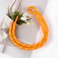 Handwoven orange strap charm with white dash pattern for DIY bags and phones - Light Orange and White