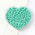 Mint green peanut twin beads in a heart container for DIY jewelry making - 5x8mm (Approx. 79 Pcs) / Green