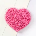 Pink peanut-shaped candy color beads for DIY jewelry making stored in heart container - 5x8mm (Approx. 79 Pieces) / Rose Red