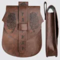 Detail view of brown leather Viking pouch with runic engravings and knotwork design - Coffee