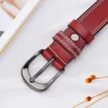 Retro dark red leather belt featuring double white stitching and metal needle buckle design - Coffee