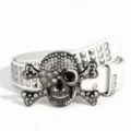 Detailed shot of punk style rhinestone skull buckle white pyramid studded leather belt. - White