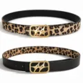 Detail view of double-sided leopard print and black leather belt with gold star buckle - 110cm / Gold Buckle Leopard Litchi Grain