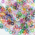 Detailed macro view of colorful painted alloy open jump rings for DIY jewelry making. - 6mm (100pcs) / Multicolor