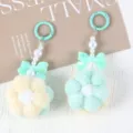 Close-up of handmade plush flower keychains with pearls and bows for bag charms - 1 Piece / Mint Green + Yellow