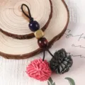 Retro PU leather tassel charm with colorful wood beads, perfect for bags and shoes decoration. - Peach Pink + Dark Gray
