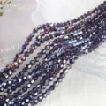 Macro view of 4mm faceted purple AB crystal bicone glass beads for DIY jewelry making - 4mm Approx 70 Pieces/Strand / Violet AB