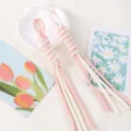 Close-up of hand-woven pink and white Roman knot lanyard with soft cotton texture - 1 Piece / Off-White + Light Green