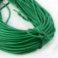 Macro view of 3mm candy green round PU leather cord with exquisite stitching for DIY - Approx 2 Meters/Bundle (3mm) / Green