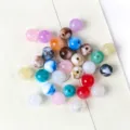Close-up of colorful marbled acrylic beads for DIY jewelry making accessories - 09 (Multicolor Marble Streamer)