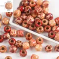 Natural wooden beads detail view with Chinese style floral patterns for DIY jewelry arts. - Barrel Bead (12x11mm) / 50 Pieces/Pack