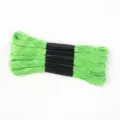Close-up detail of 5 bundles of bright green polyester embroidery thread with black bands - 5 Pcs Set / Green