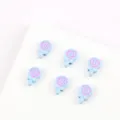 Close-up detail of cute lollipop shaped alloy enamel beads, perfect for DIY jewelry making. - 14