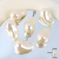 Detailed close-up shot of baroque acrylic pearl loose beads showing irregular shape and luster. - Gourd Style / 7 Pieces/Pack / Beige
