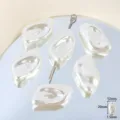 Close-up of irregular baroque pearl acrylic beads, smooth finish, perfect for DIY jewelry making. - Leaf Style / 18 Pieces/Pack / White
