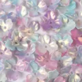 Macro view showing the pearlescent iridescent finish of trifoliate magnolia flower beads - 10 Pieces/Pack / Pink Purple Blue Gradient (02)